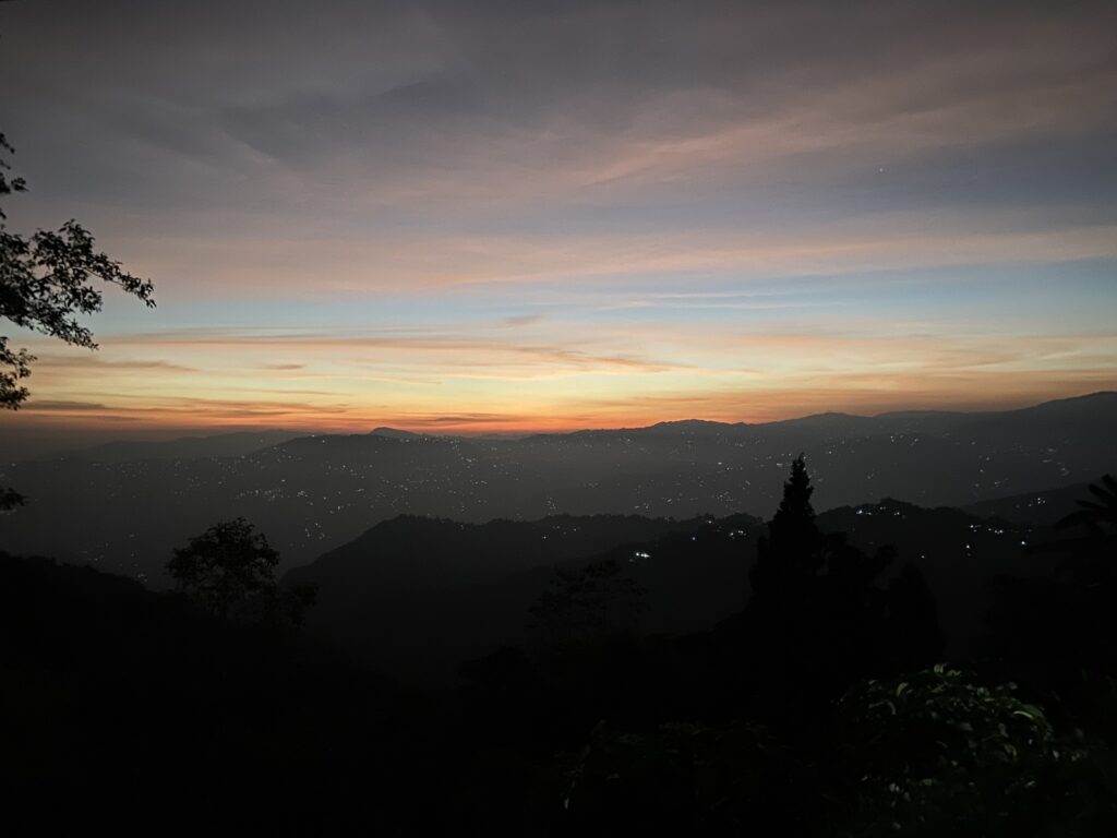 A stop in the biking trip to admire the sparkling mountains of Darjeeling, West Bengal